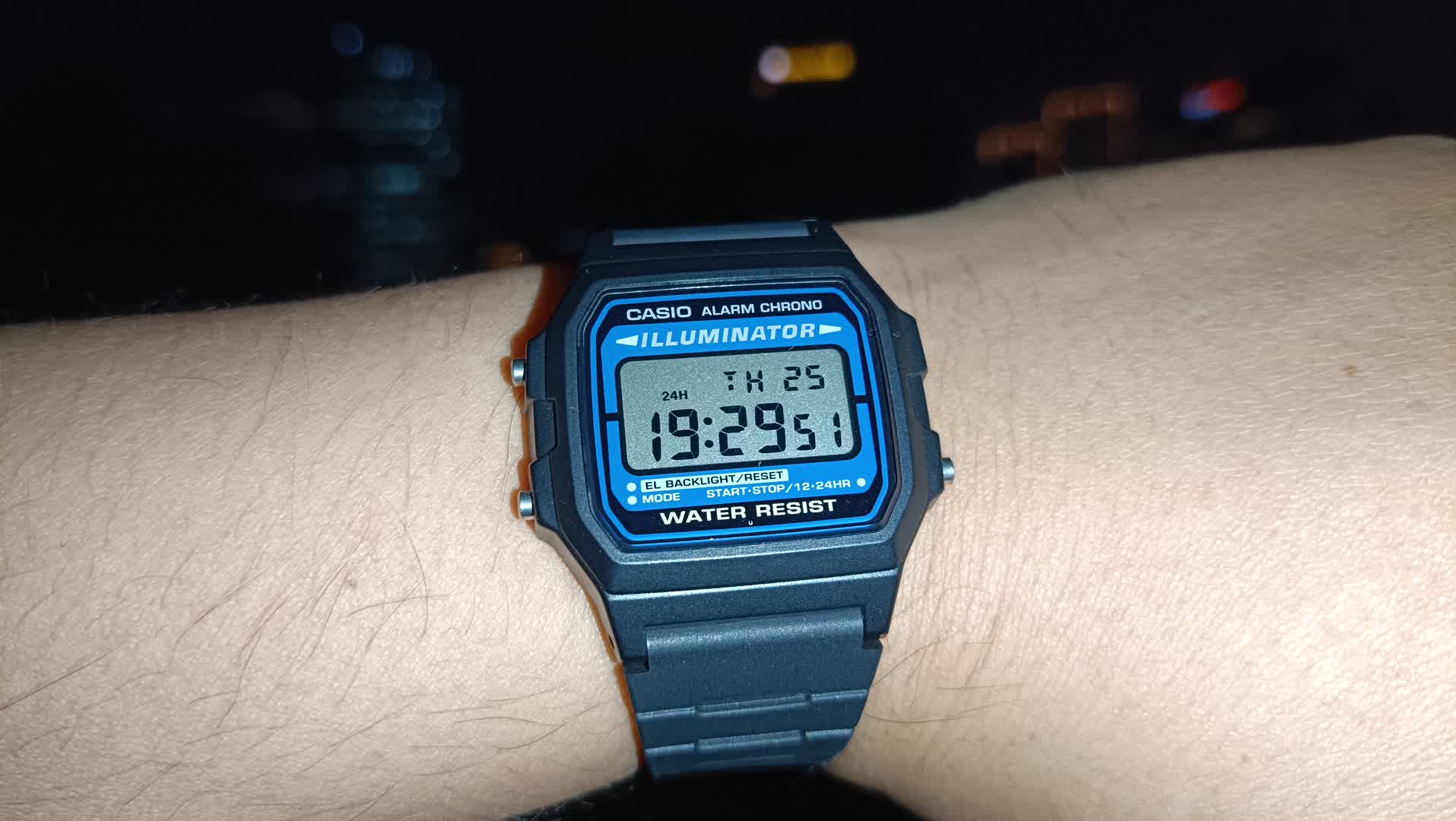 Photo me wearing Casio F-105 on my left wrist. Dark background because the photo was taken at night.